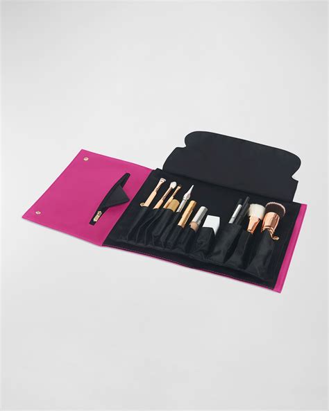 Close-up of the Kusshi Makeup Brush Organizer Clutch, highlighting the individual brush pockets and premium leather exterior.