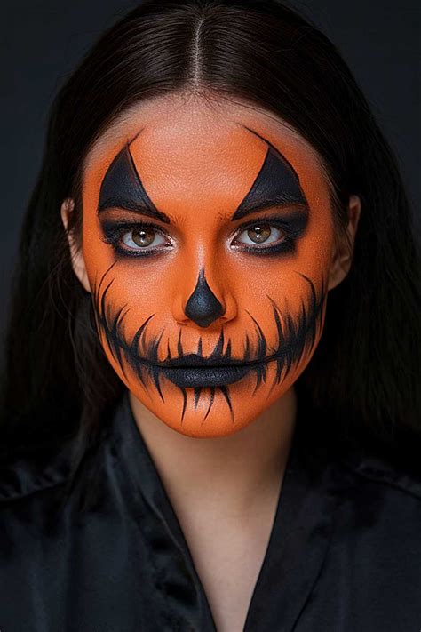 A full-face shot of a completed half-skeleton Halloween makeup look, showcasing the blend of spooky and glamorous elements.
