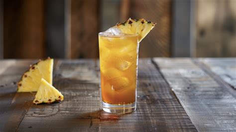 A refreshing glass of pineapple tea, perfect for a summer day.