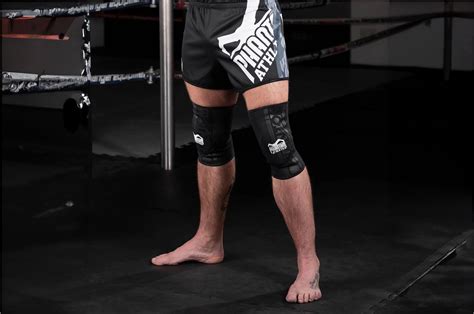 Action shot of a grappler wearing Apex Grappling Shorts, emphasizing freedom of movement during a takedown attempt.