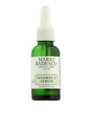 Close-up of Mario Badescu Vitamin C Serum bottle, showing dropper and green glass
