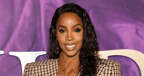 Kelly Rowland in a vibrant swimsuit, showcasing her confidence and body acceptance.