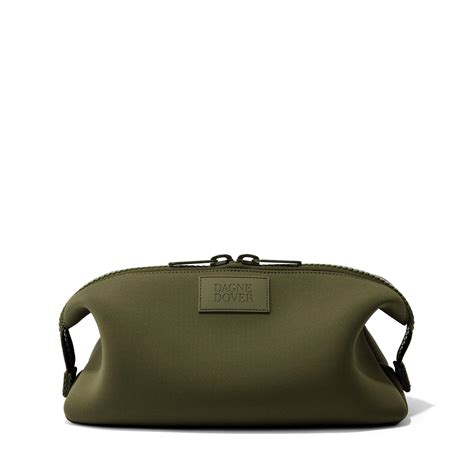 The Dagne Dover Hunter Toiletry Bag shown with its interior compartments.