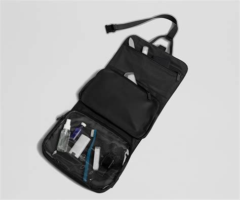 The Away Hanging Toiletry Bag shown in both its compact and expanded, hanging form.