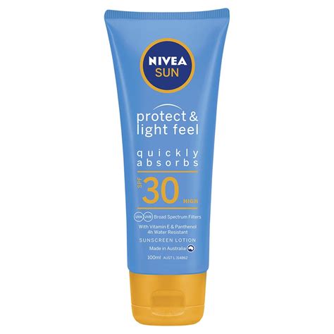 A close-up shot of the NIVEA SUN Protect & Light Feel Sensitive Sun Serum tube, highlighting its packaging and branding.