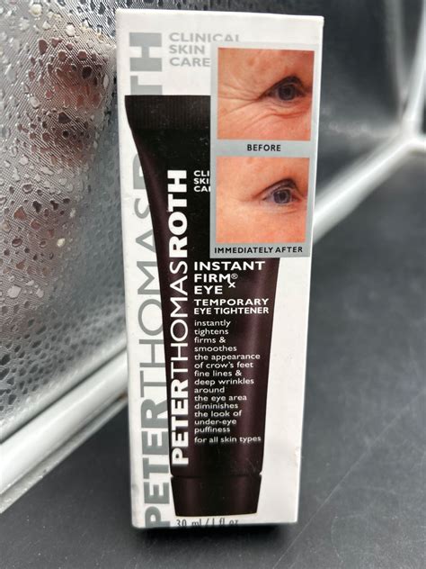 A close-up image of the Peter Thomas Roth Instant FirmX Eye product packaging, highlighting its key features.
