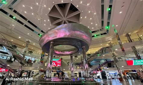 A collage of storefronts inside Al Rashid Mall, showcasing diverse brands.