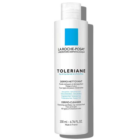 A close-up shot of the La Roche-Posay Toleriane Dermo Milky Cleanser bottle, highlighting its minimalist design and the brand's signature blue and white colors.
