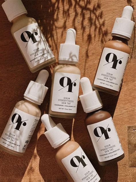 Product shot of the Olive Rose makeup line, highlighting the skin tint and other items.