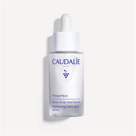 A close-up of the Caudalie Vinoperfect serum texture on skin, highlighting its silky and satiny finish.