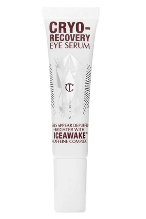 Close-up of the metal applicator of the Cryo-Recovery Eye Serum being used under the eye