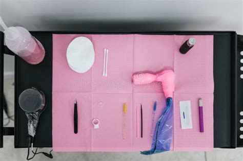 Illustration of a clean microblading workstation with all essential pre-treatment supplies laid out neatly.