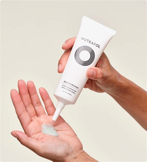 Close-up of the texture of the Nutrafol Exfoliating Scalp Mask, highlighting its natural ingredients