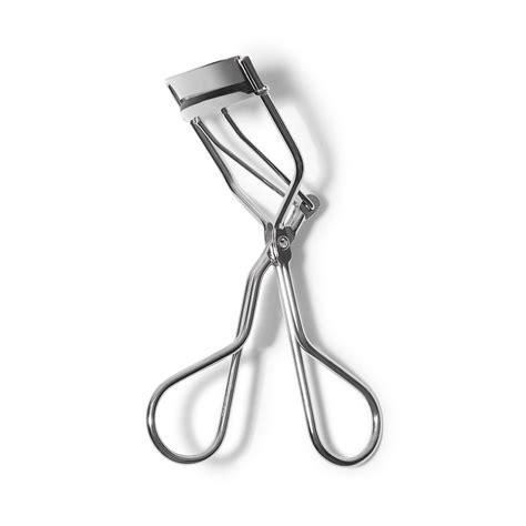 Diagram illustrating the correct way to use an eyelash curler, showing multiple pressure points.