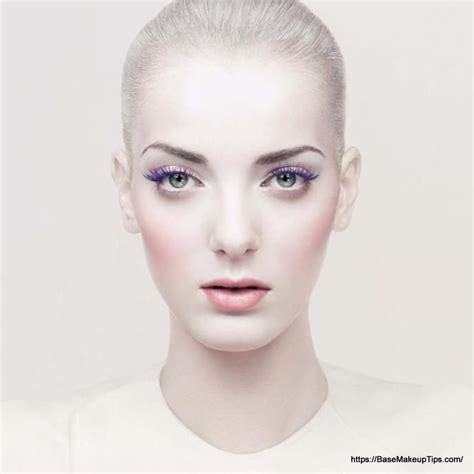 face covered in white makeup base
