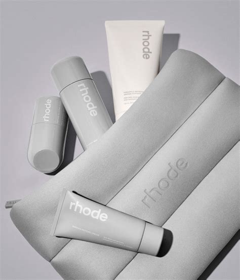 Illustration of the rhode skincare essentials collection presented in the rhode bubble bag.