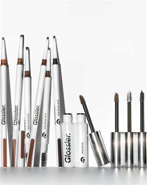 Close-up of someone applying Glossier Boy Brow