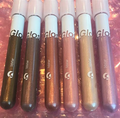 Swatches of Glossier Lidstar shades on eyelids