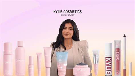 Kylie Jenner posing with various beauty products, highlighting her influence in the makeup industry.