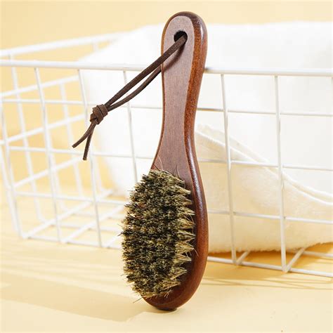 A high-quality beard brush with boar's hair bristles.