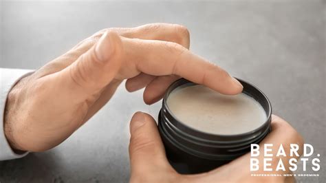 A tin of beard balm, illustrating its solid consistency.