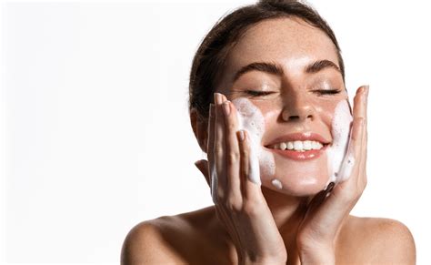 Split image: Left side shows a person applying oil cleanser, right side shows a person applying water-based cleanser.