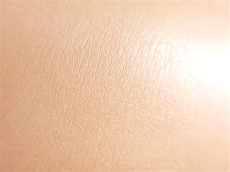 Close-up photo of smooth, hydrated skin highlighting texture improvement.