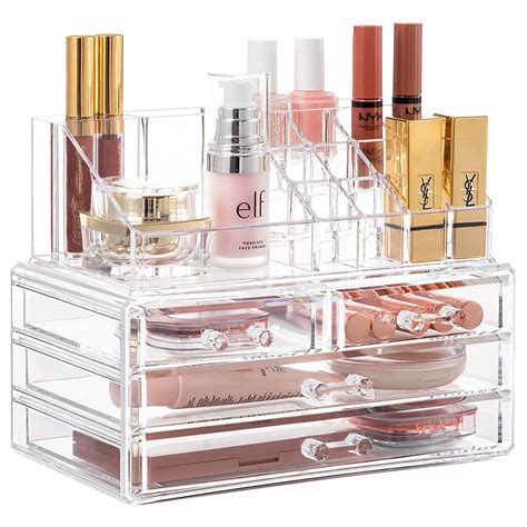 A collection of clear acrylic makeup organizers neatly arranged on a vanity.