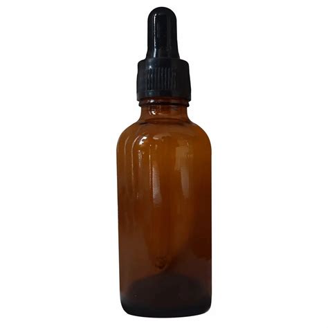 Close-up shot of Palmer's Facial Oil dropper bottle, showing its amber color.