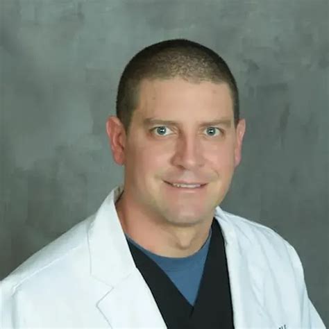 Photo of Nicholas Benites, PA-C, in a professional setting.