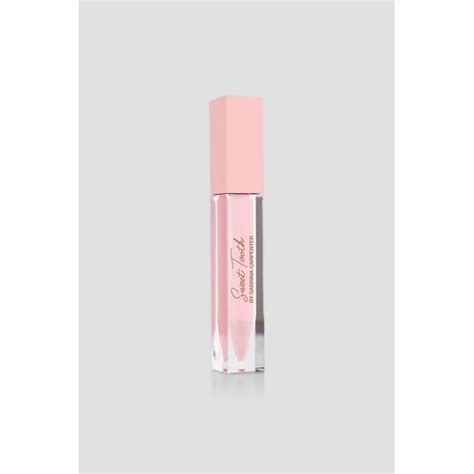 A photograph of the Sweet Tooth by Sabrina Carpenter lip gloss, highlighting its packaging and applicator.