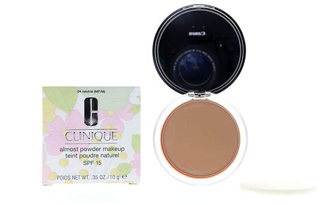 Close-up of Clinique Almost Powder Foundation SPF15 04 Neutral texture on skin, showcasing sheer coverage and natural finish