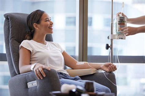 A patient receiving IV infusion therapy in a comfortable spa setting