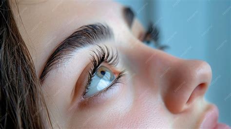 Close-up of a woman with beautifully applied eyelash extensions