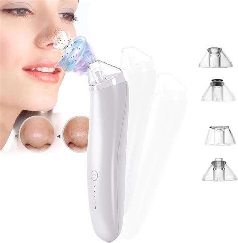 A person using a pore vacuum device on their face, focusing on the nose area.