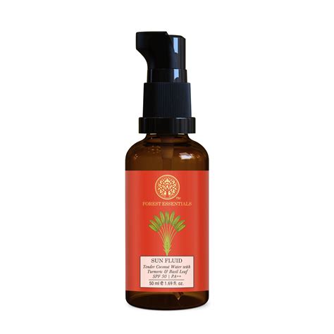 Aesthetic shot of the Forest Essentials Sun Fluid bottle, possibly with natural elements like leaves or flowers.