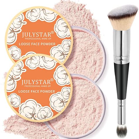 A powder brush dusting loose powder onto a face with a soft, diffused effect.