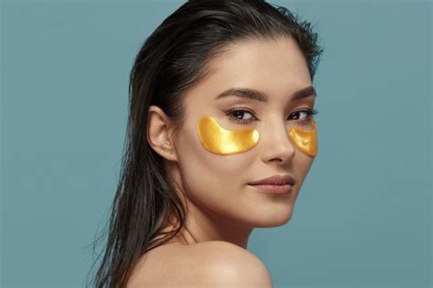 An assortment of under-eye patches arranged neatly in a skincare fridge.
