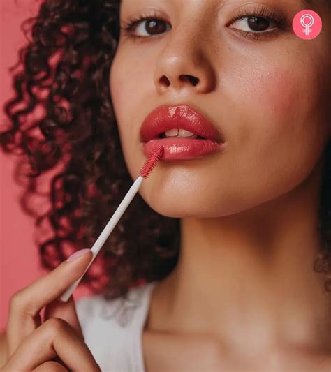 Illustration of a person applying lip stain with a wand