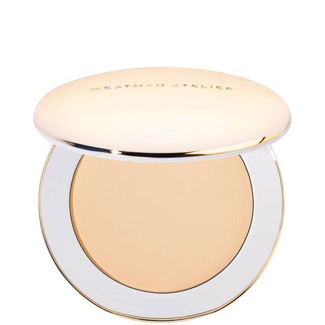 Elegant gold compact of Westman Atelier Vital Pressed Skincare Blurring Talc-Free Setting Powder