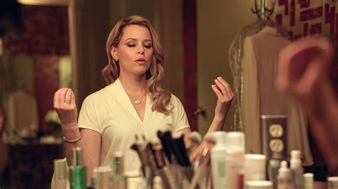 Elizabeth Banks as Hope Goldman, a driven aesthetician preparing to launch her skincare line