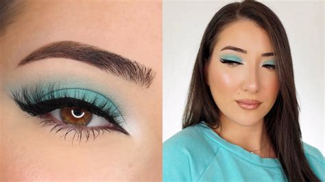Final look of the teal smoky half-moon eye makeup