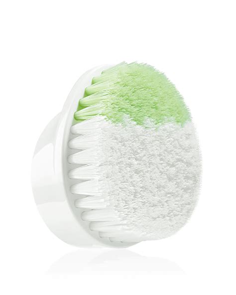 A close-up image showing the dual-fibre bristles of the Clinique Sonic System brush head.