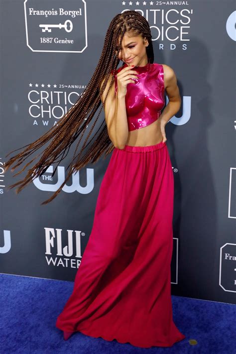 Photo of Zendaya with glossy, medium-sized box braids