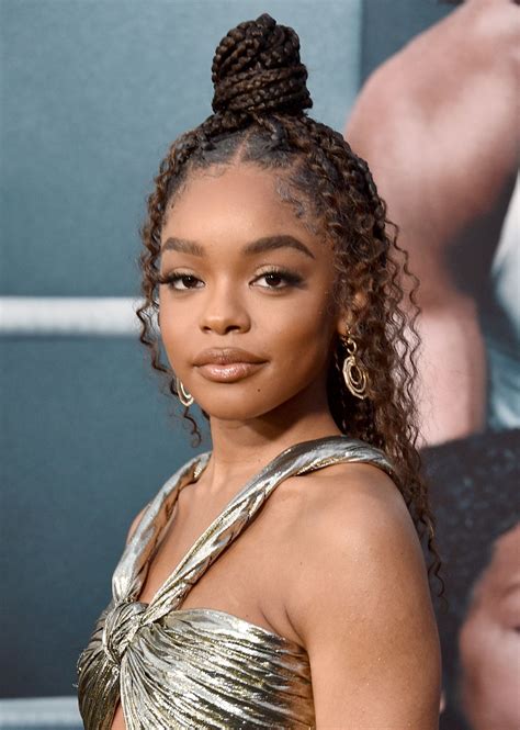 Marsai Martin with medium box braids styled into multiple buns