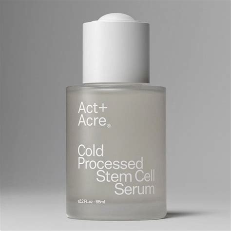 Close-up photo of the ACT Acre Stem Cell Scalp Serum bottle and applicator, demonstrating its lightweight texture.