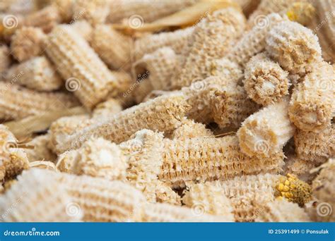 Close-up of finely granulated corn cob meal texture for exfoliation
