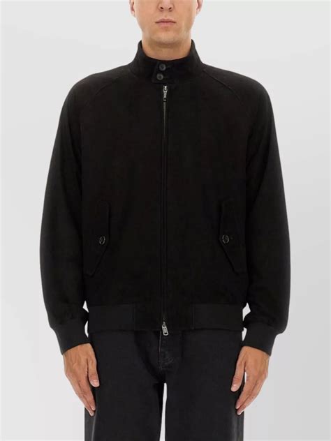 Detail shot of the jacket's pockets and ribbed cuffs