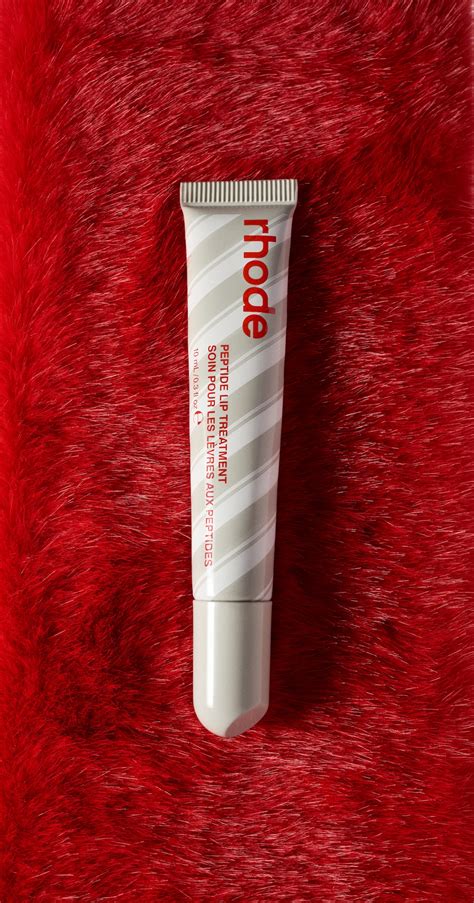 A visually appealing shot of the Rhode Peptide Lip Treatment in Peppermint Glaze, showcasing its frosty shimmer.