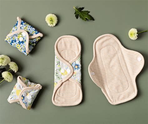 Close-up of reusable cotton pads made from soft flannel material, some in various colors and patterns.
